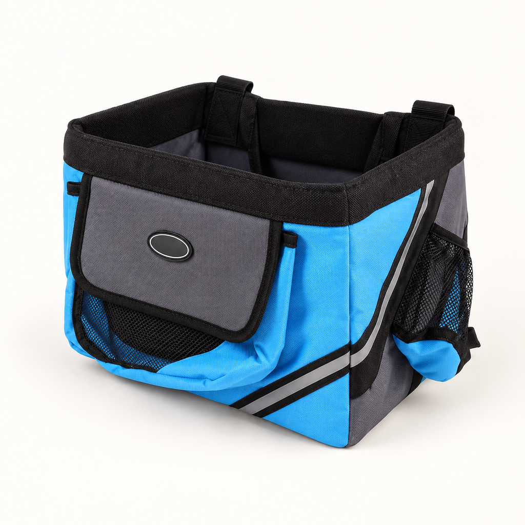 Blue bicycle basket carrier with grey front flap and black padded rim, shown off the bicycle